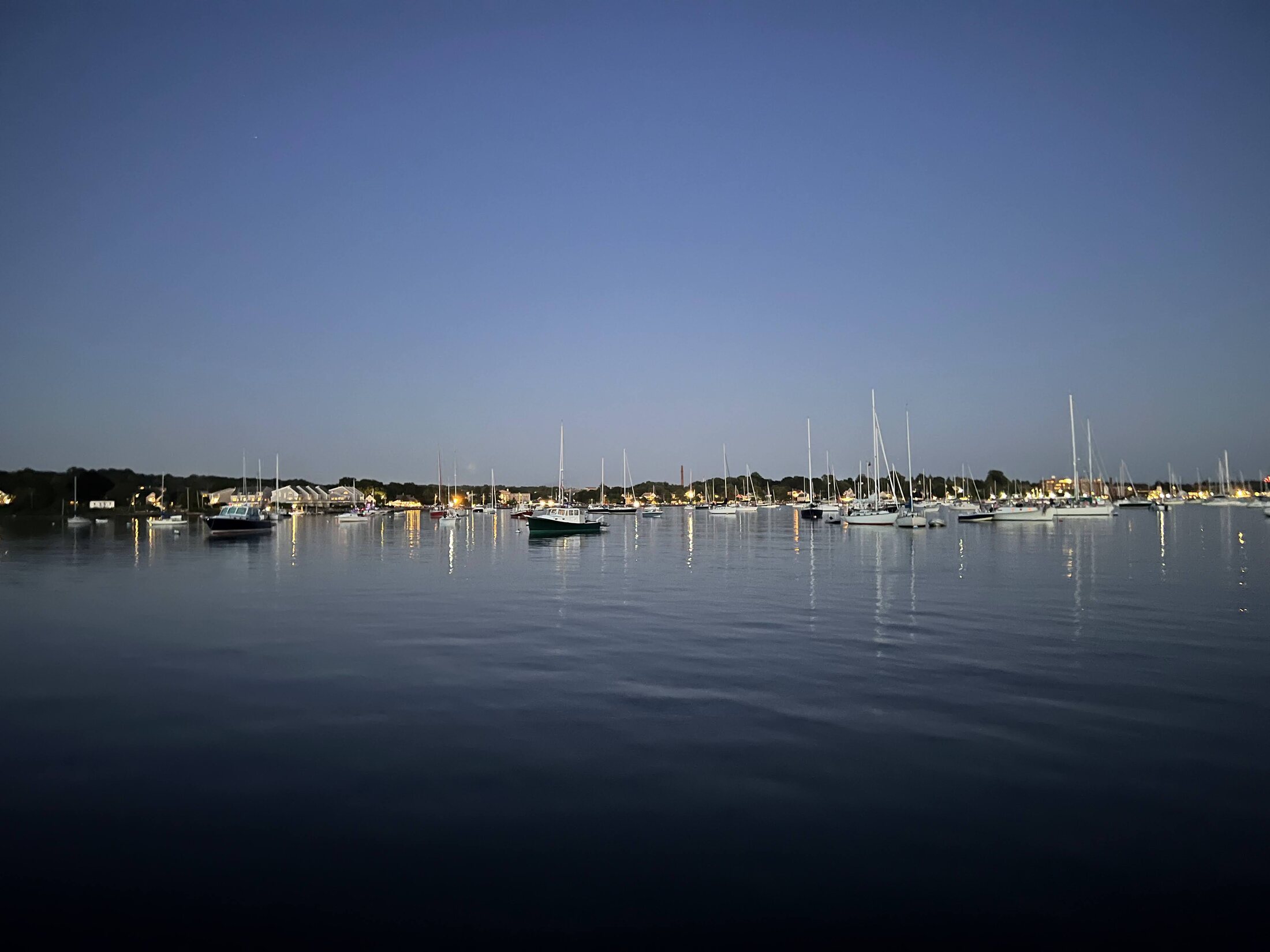 Calm evening water and moored boats
